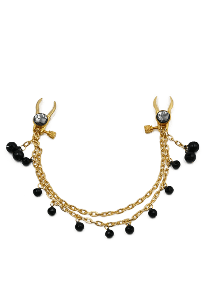 Elegant black and gold nipple clamps with gemstone accents and dangling bell chains