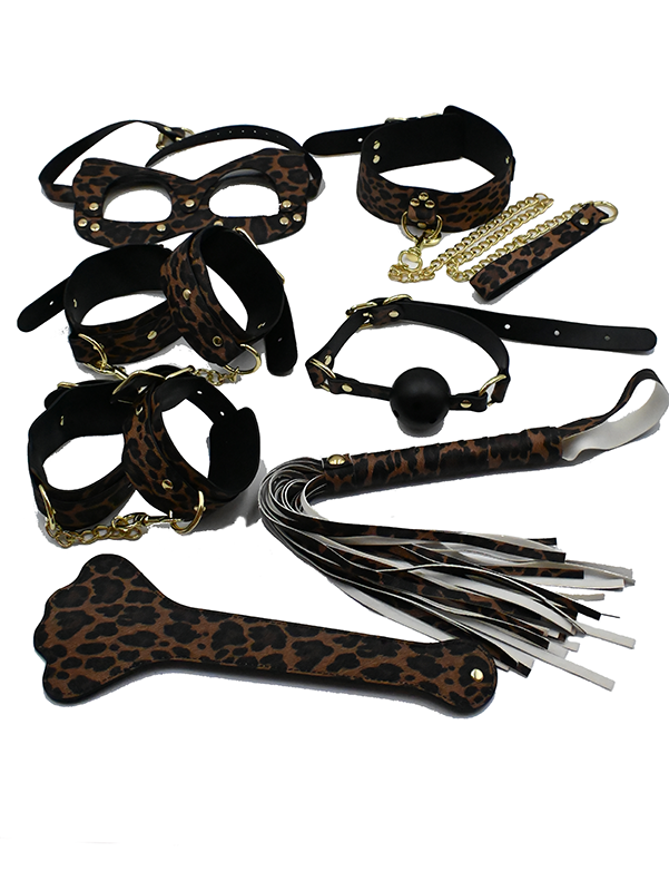 Leopard print BDSM 7-piece kit with restraints, mask, ball gag, leash, flogger, and paddle