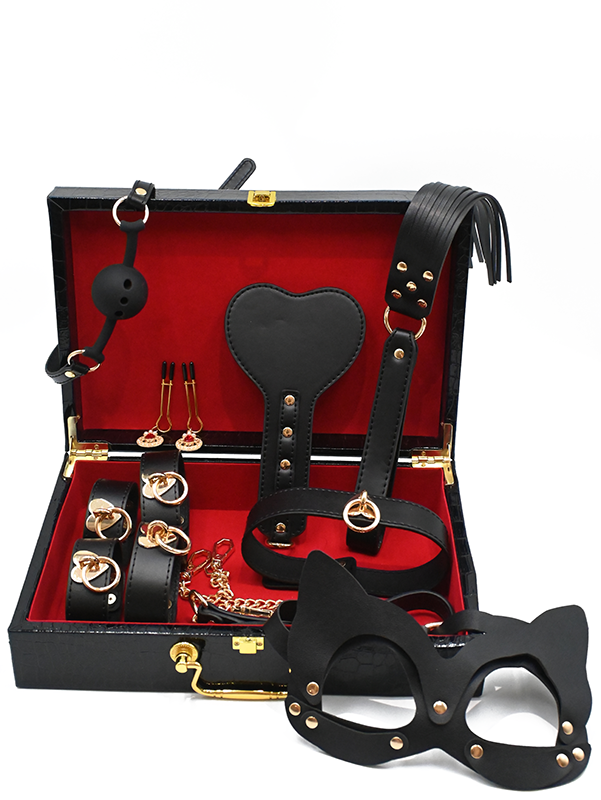 8-piece luxury black leather BDSM kit with gold accents, cat mask, and red-lined storage case