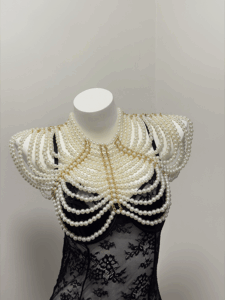 Sexy pearl lingerie harness with elegant layered pearl body chain for women.