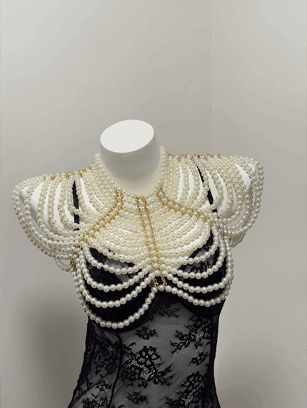 Sexy pearl lingerie harness with elegant layered pearl body chain for women.